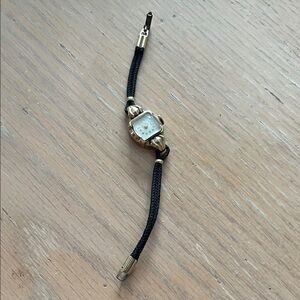 Elegant Gold and Black Women's Watch